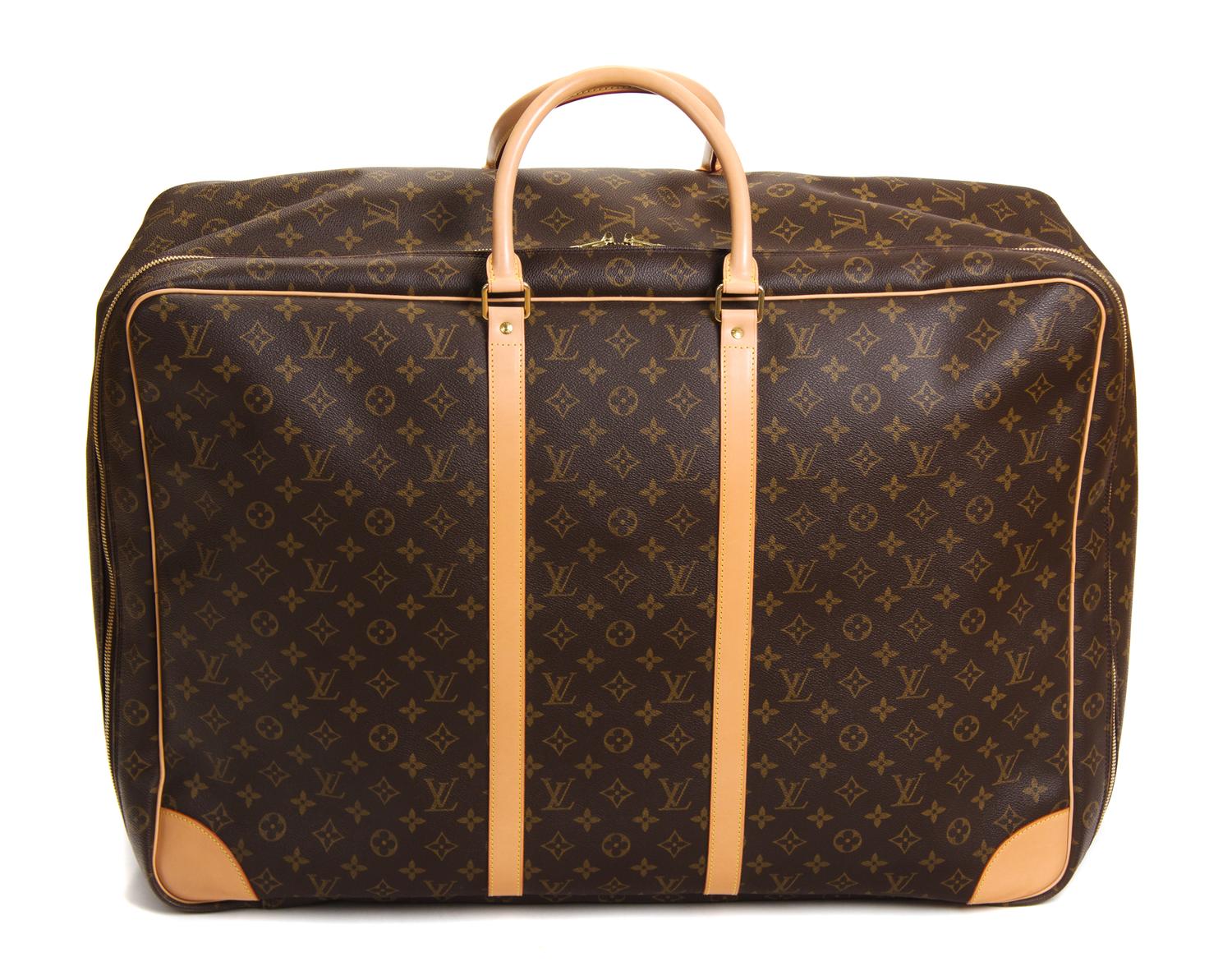 A Louis Vuitton Monogram Canvas Sirius Soft Sided Suitcase, 18"H x 25.5"W x 8.5"D; Handle drop: 5.5".