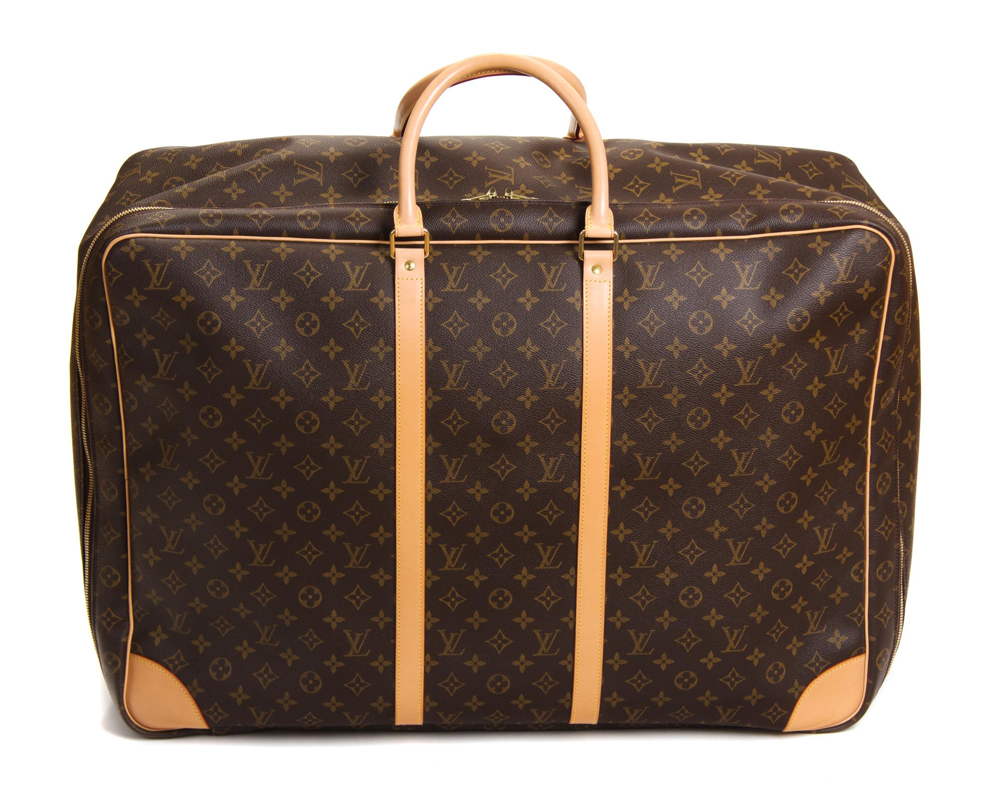 A Louis Vuitton Monogram Canvas Sirius Soft Sided Suitcase, 18"H x 25.5"W x 8.5"D; Handle drop: 5.5".
