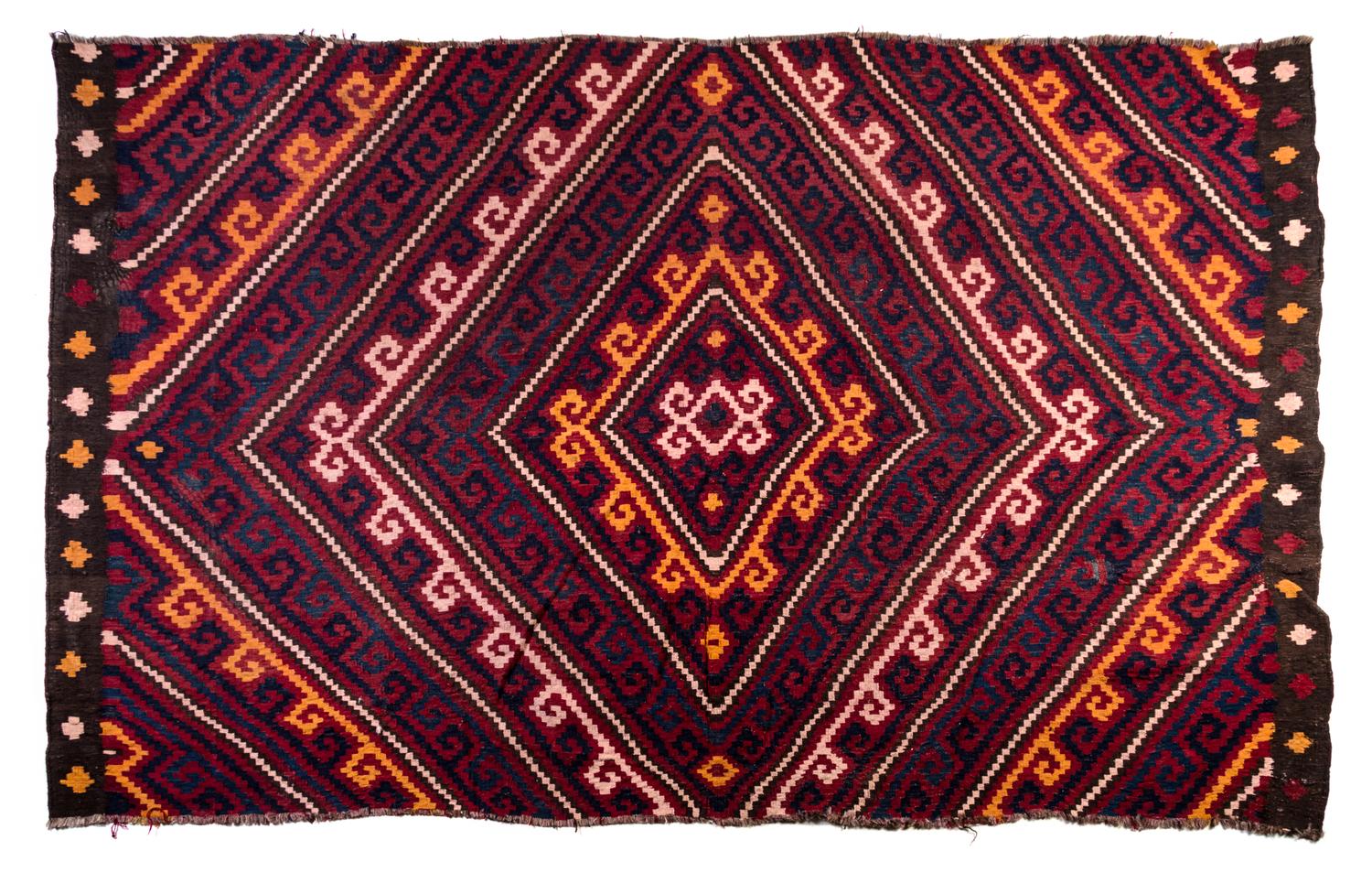 A Kilim Wool Rug Dimensions of rug 9 feet 8 inches x 6 feet 1 inch.