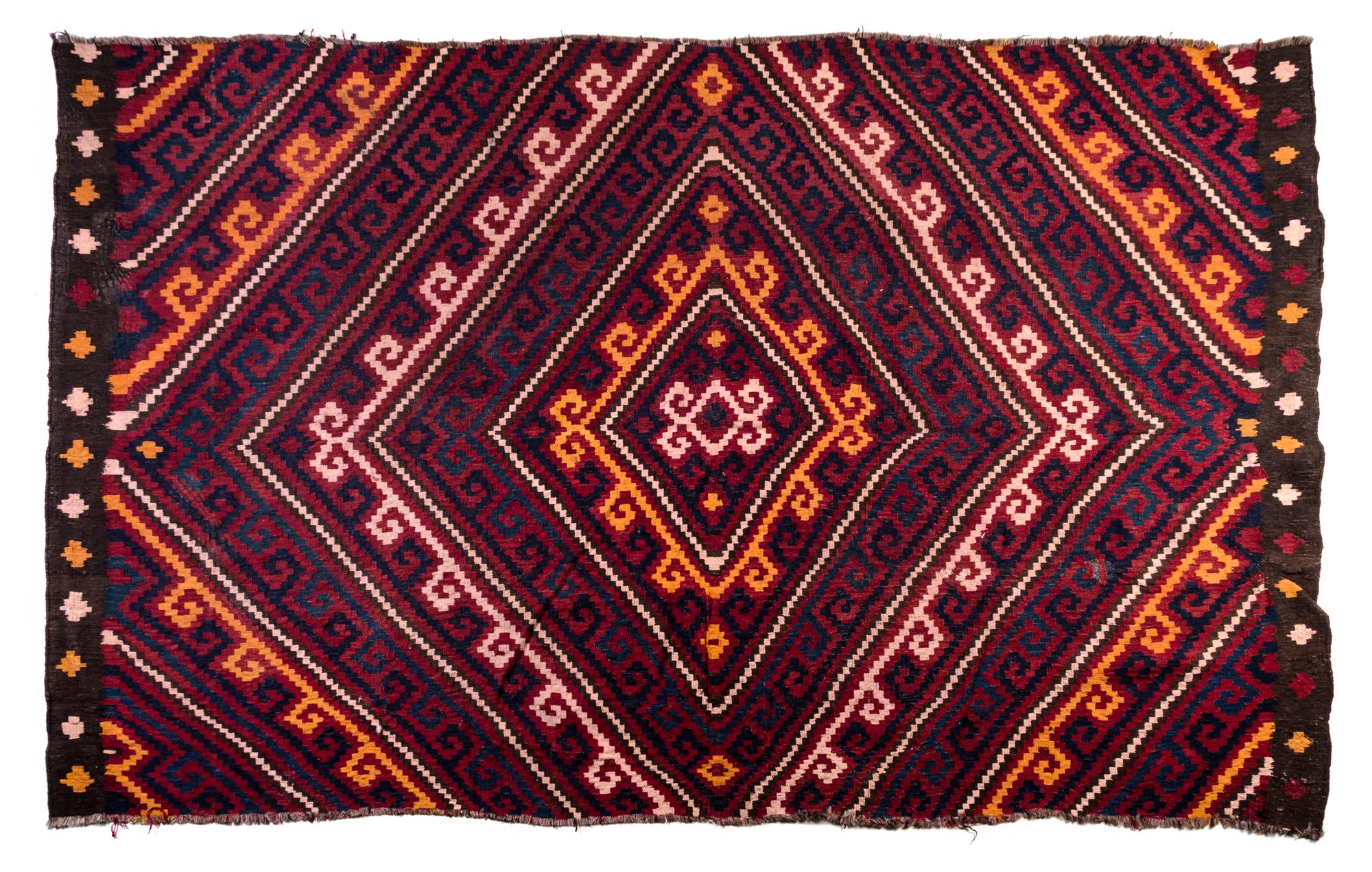 A Kilim Wool Rug Dimensions of rug 9 feet 8 inches x 6 feet 1 inch.