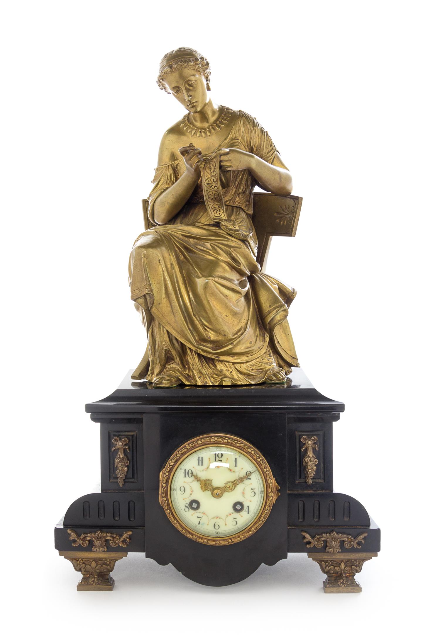 A Continental Gilt Bronze and Slate Mantel Clock Height 19 inches. — 19TH CENTURY