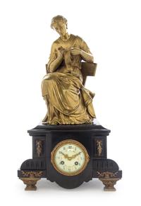 A Continental Gilt Bronze and Slate Mantel Clock Height 19 inches. — 19TH CENTURY
