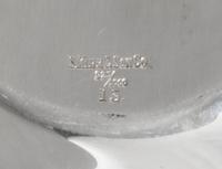 An American Silver Bowl, S. Kirk & Son, Baltimore, MD, Early 20th Century, circular, the undulating border chased with vines of flowers