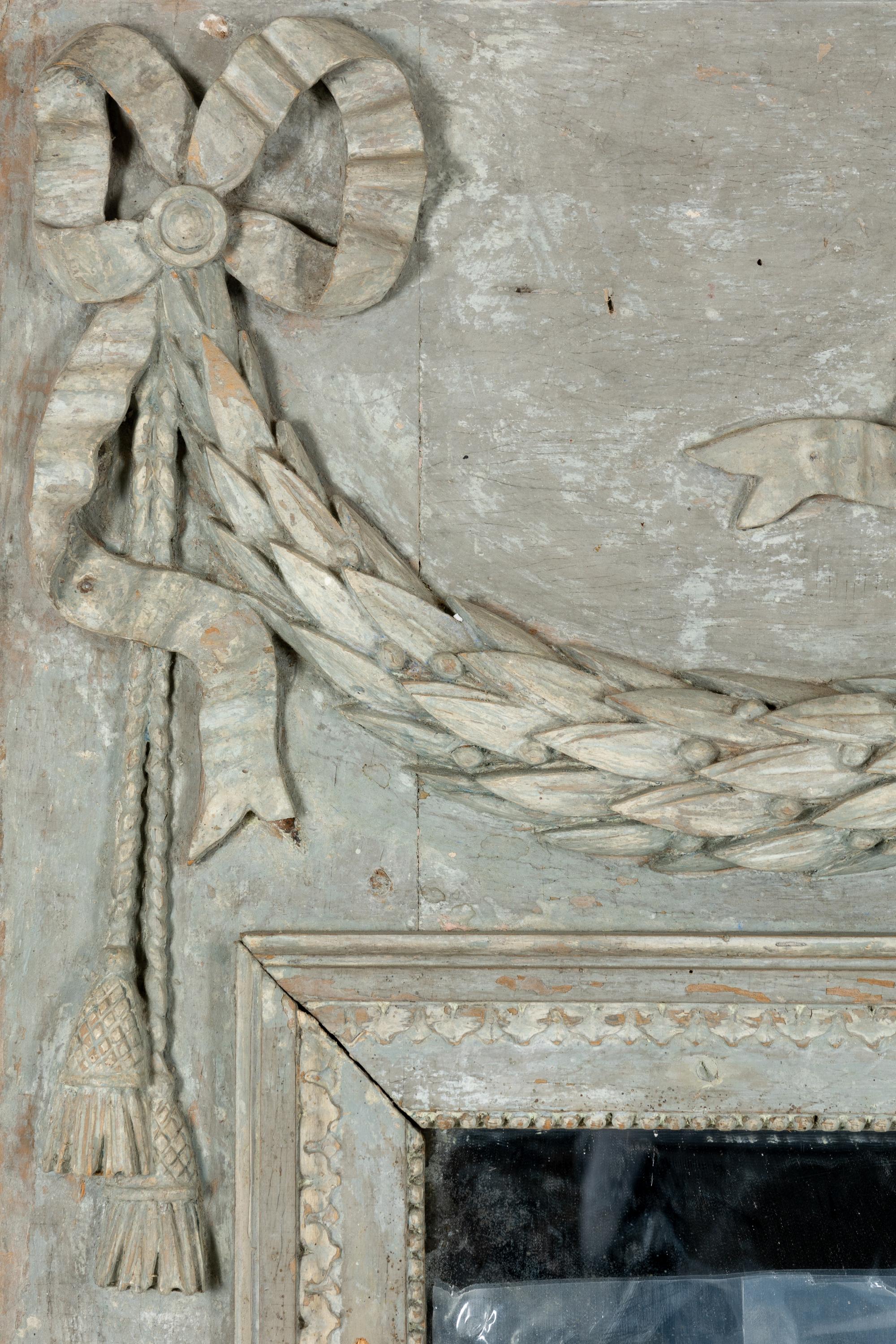 A Louis XVI Grey-Painted and Carved Trumeau