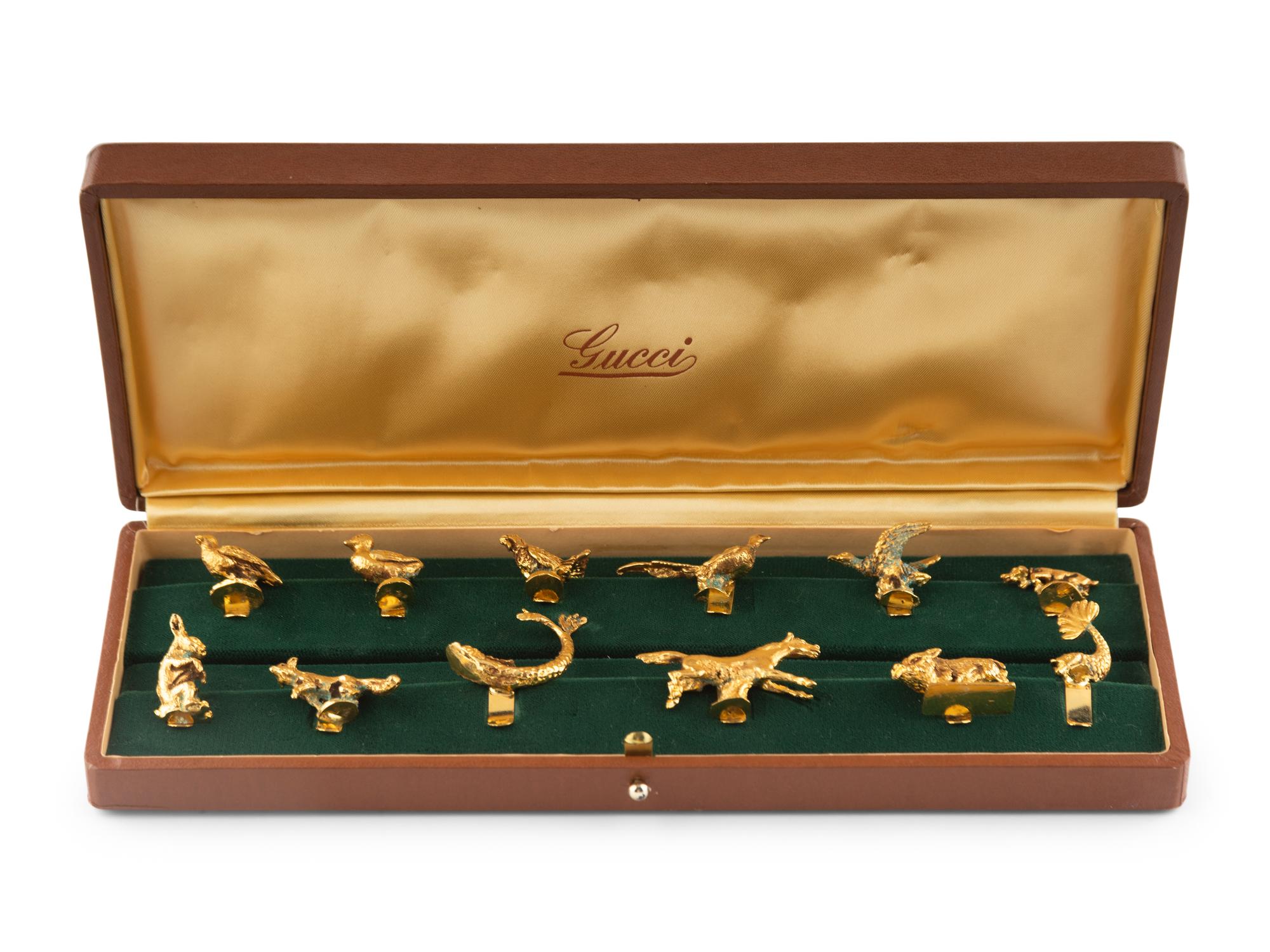 A Cased Set of Twelve Animal Stemware Charms Retailed by Gucci