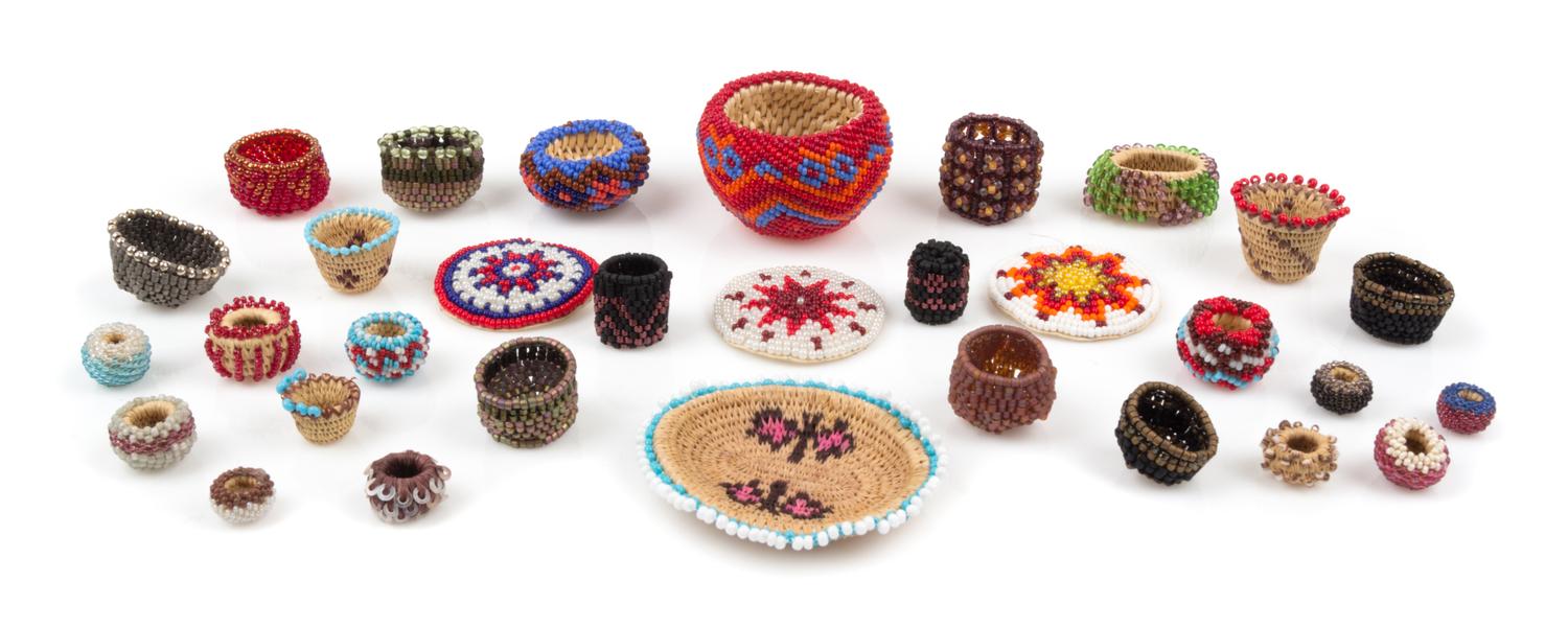 A Group of Native American Beaded Baskets Width of widest 2 inches.