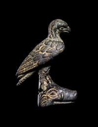 A Roman Bronze Eagle Perched on a Boar's Head