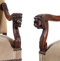 A Pair of Louis XIV Style Carved Walnut Armchairs