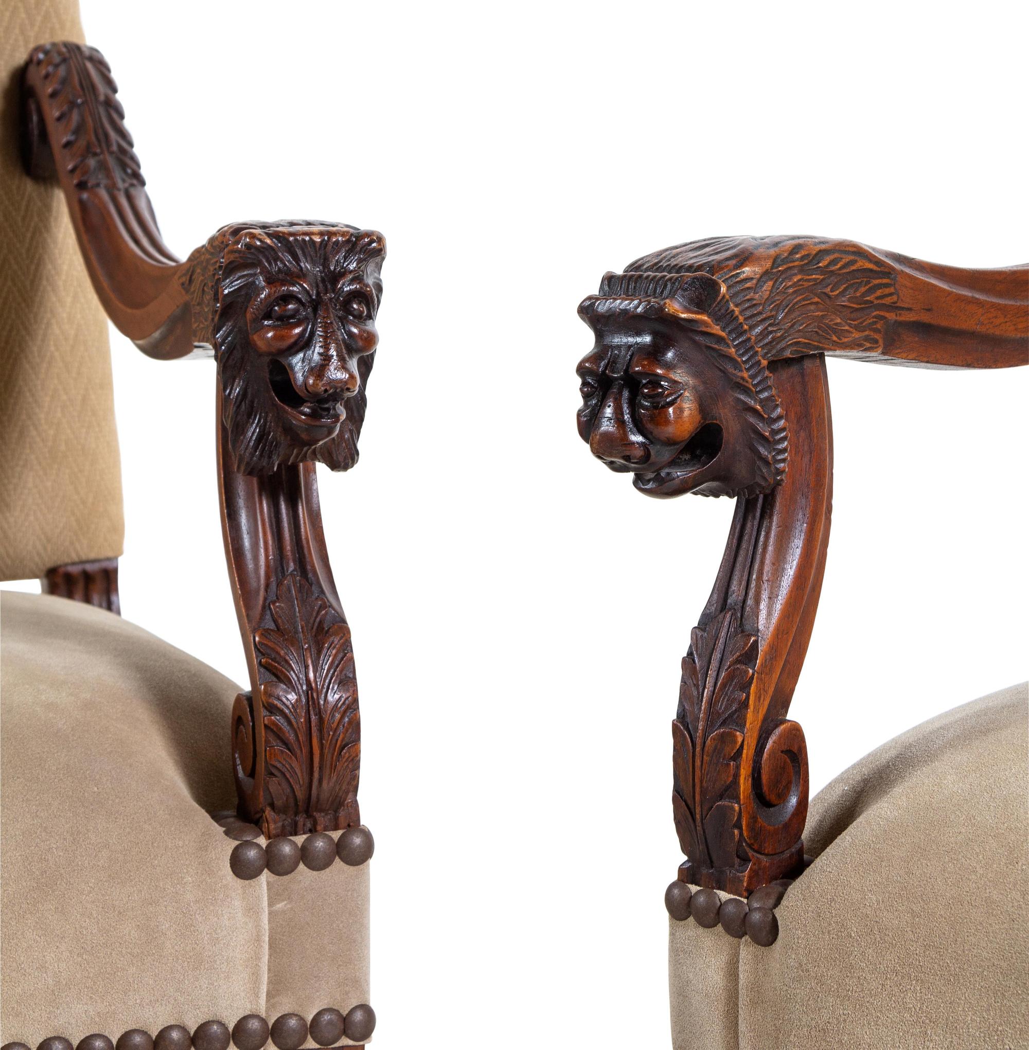 A Pair of Louis XIV Style Carved Walnut Armchairs