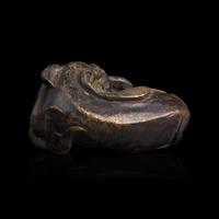 A Chinese Patinated Bronze Figure of a Stylized Lion, Late Ming-Early Qing Dynasty — 明末清初 銅獅鎮紙