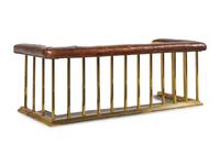 An English Leather-Upholstered Brass Club Fender