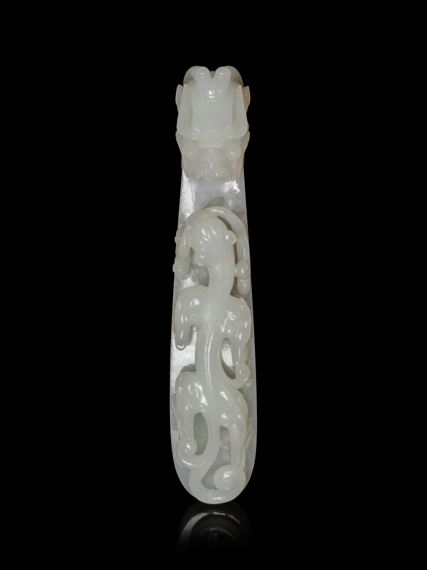 A Large and Finely Carved White Jade 'Chilong' Belt Hook