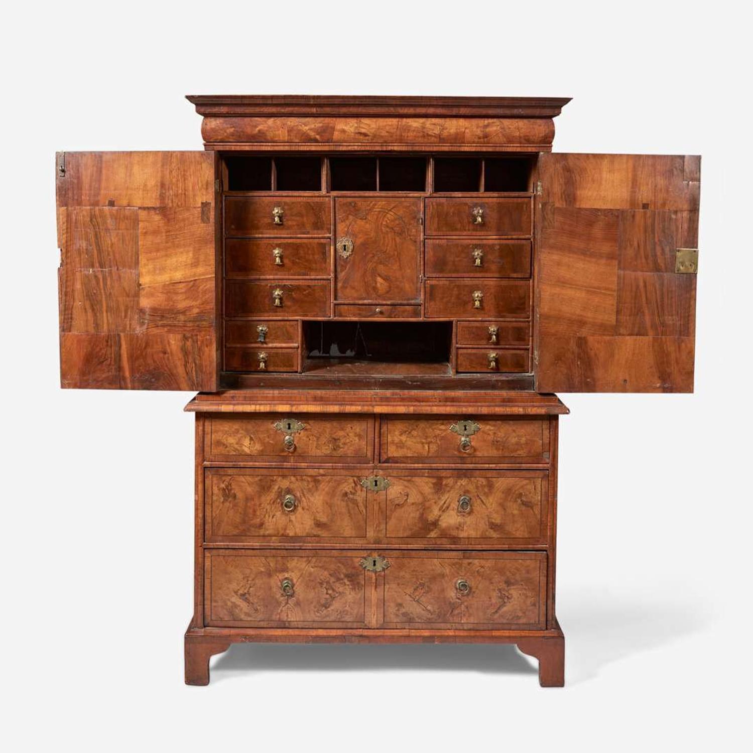 A William & Mary oyster veneered walnut secretary bookcase circa 1700