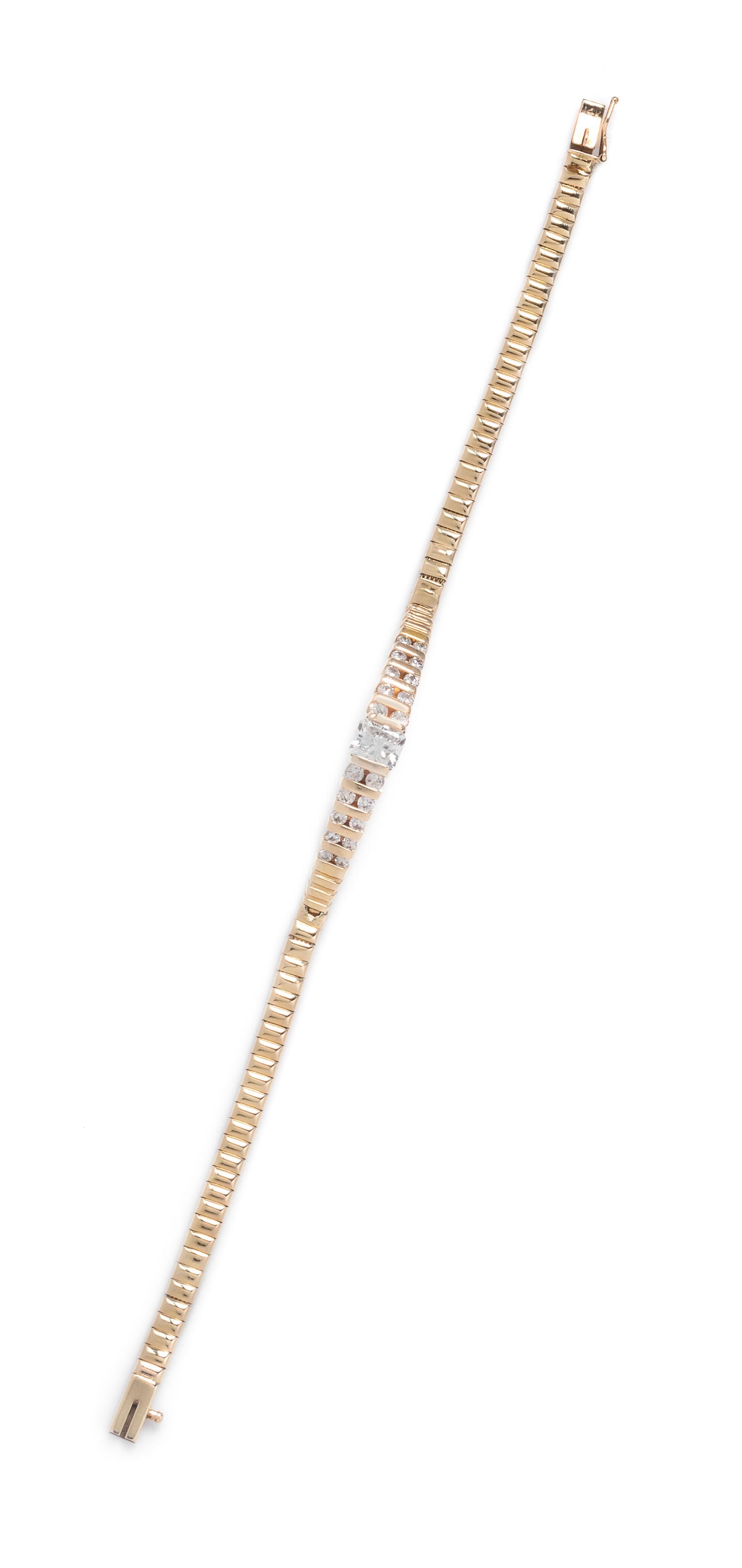 A 14 Karat Yellow Gold and Diamond Bracelet,