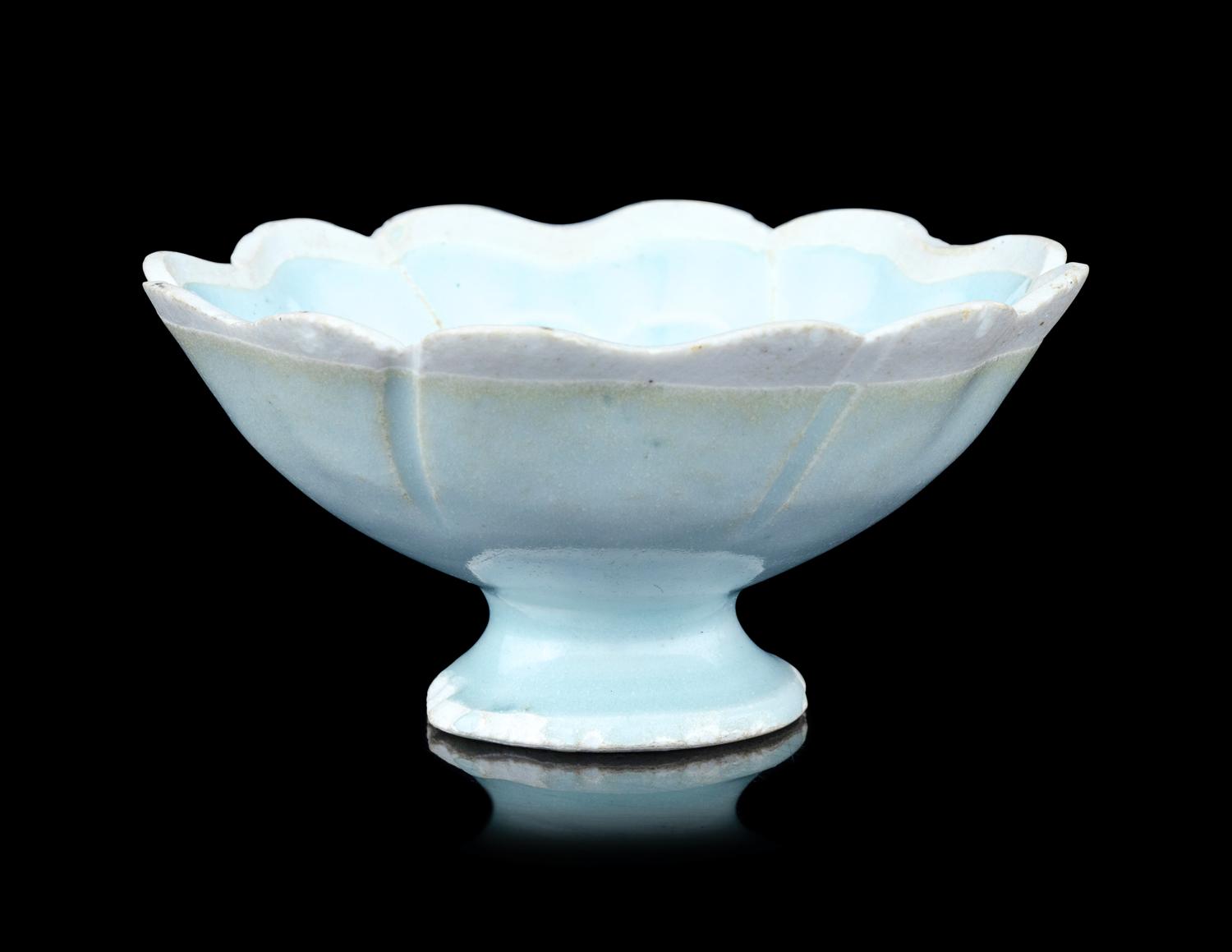 A Yingqing Glazed Porcelain 'Foliate' Footed Bowl