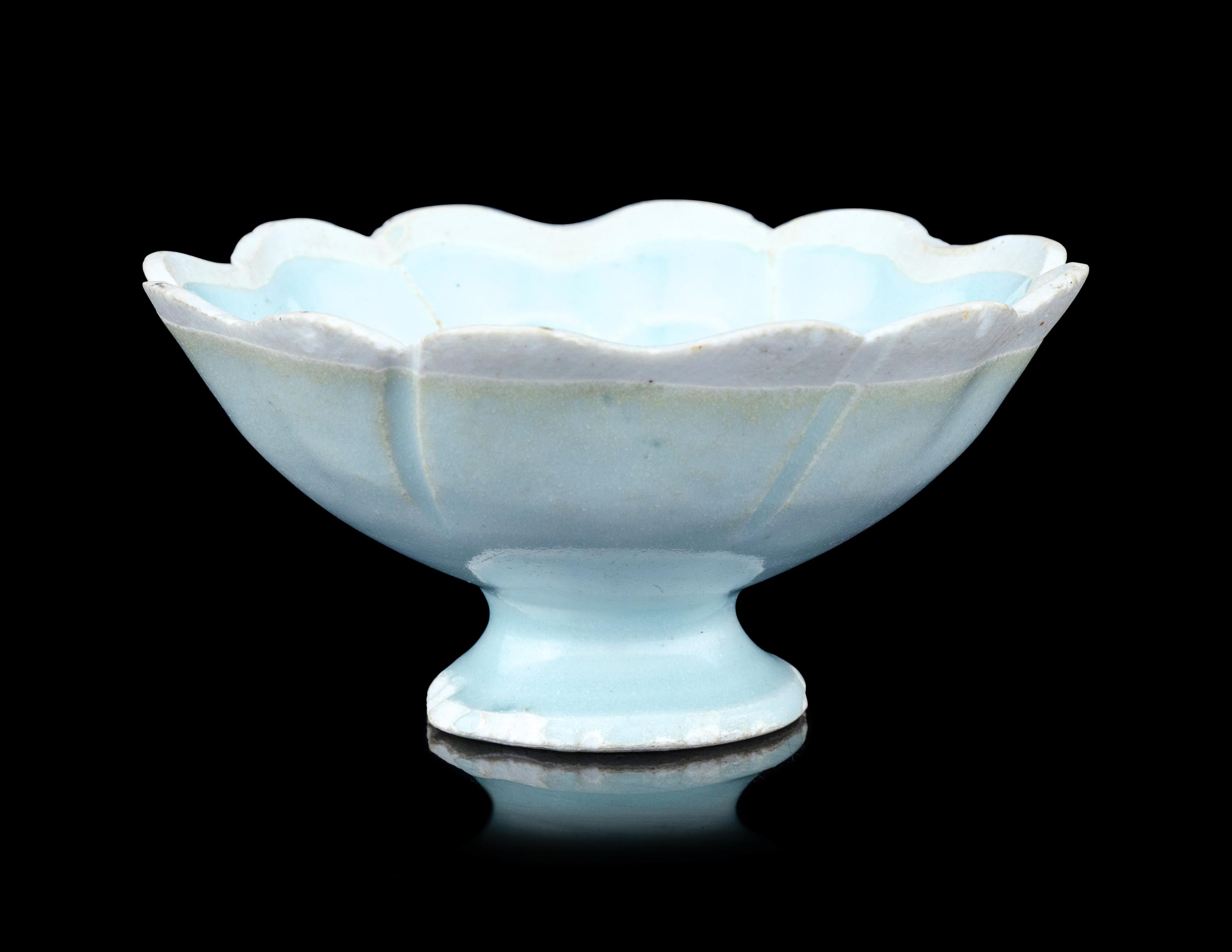 A Yingqing Glazed Porcelain 'Foliate' Footed Bowl