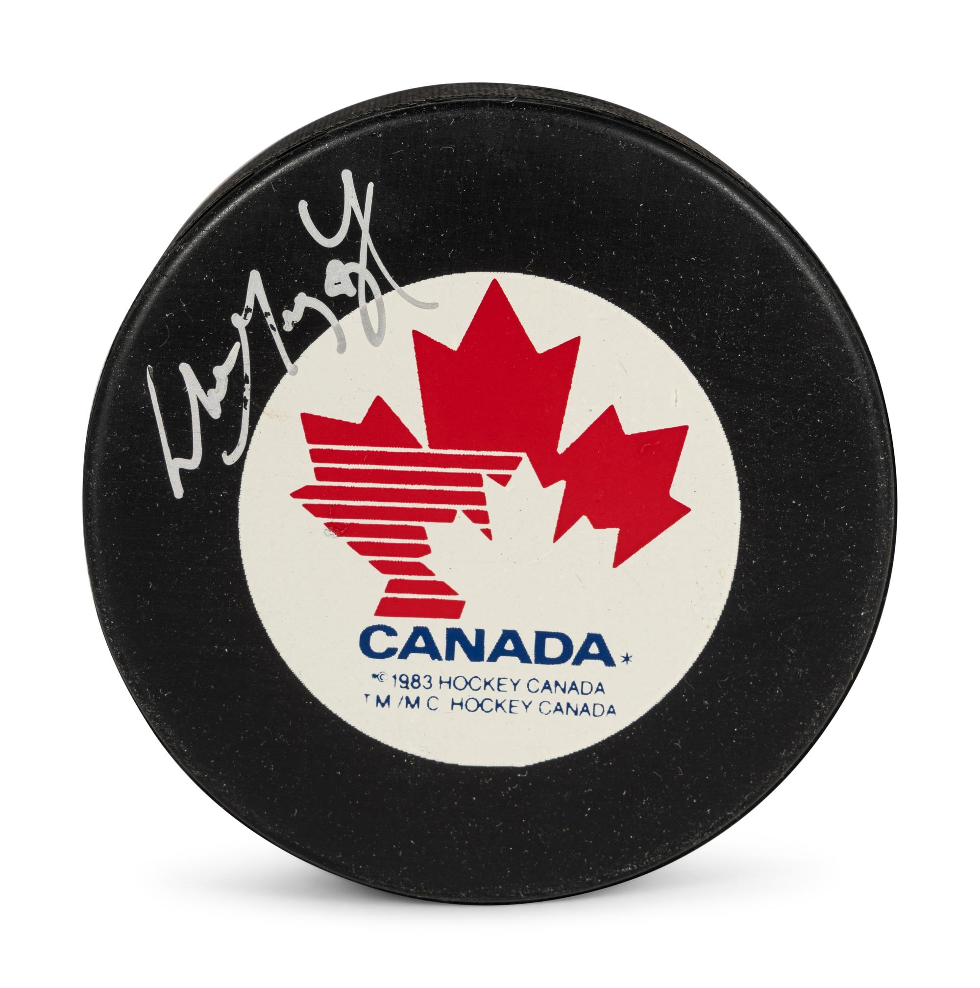 A Wayne Gretzky Signed Autograph Canada Hockey Puck (Beckett Authentication Services Letter BAS Certified),