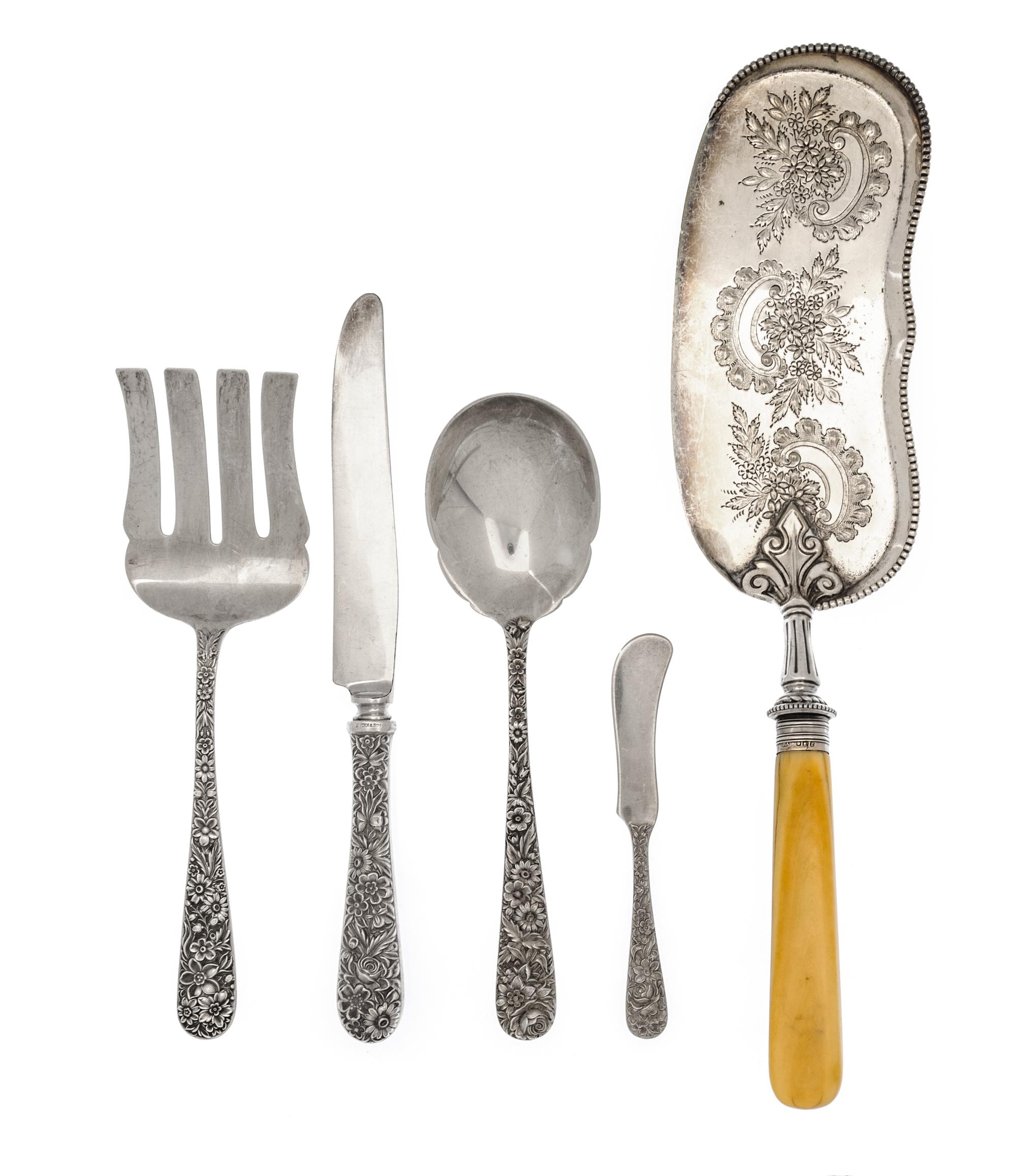 A Group of American Silver Flatware, S. Kirk & Son, Philadelphia, PA, Repousse pattern, comprising: 7 dinner knives 3 butter spreaders