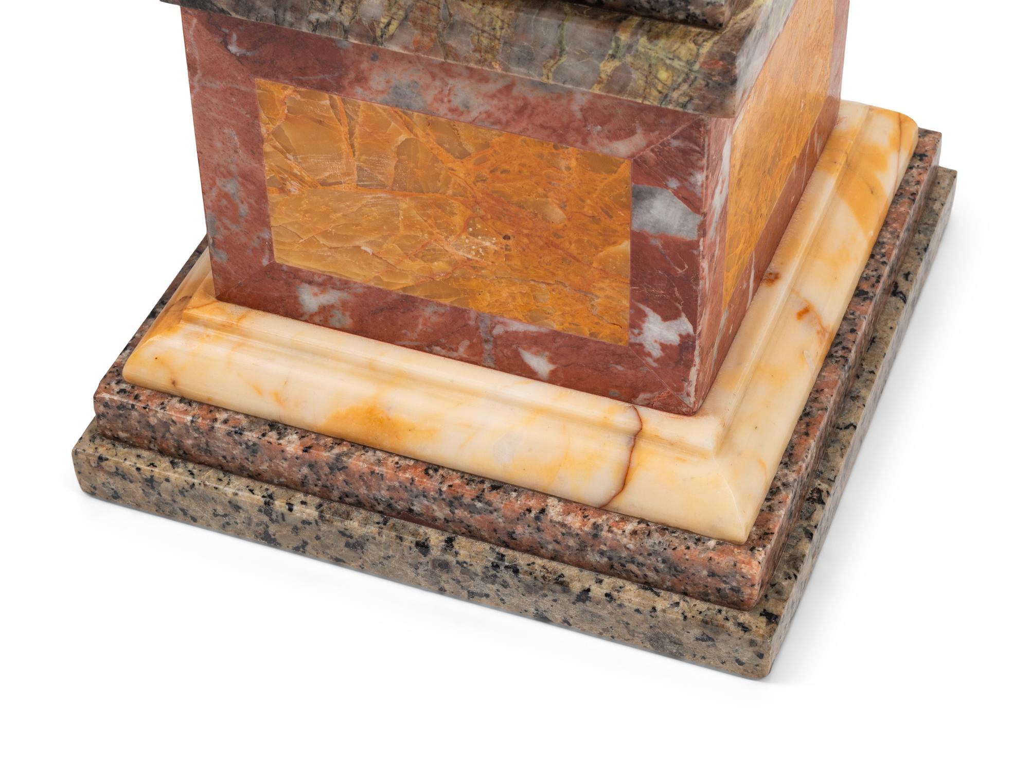 A Pair of Grand Tour Style Vari-Color Marble Ornaments