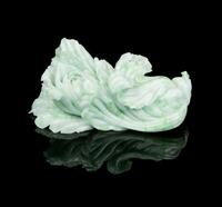 A Jadeite Carved Cabbage Width 7 5/8 inches.