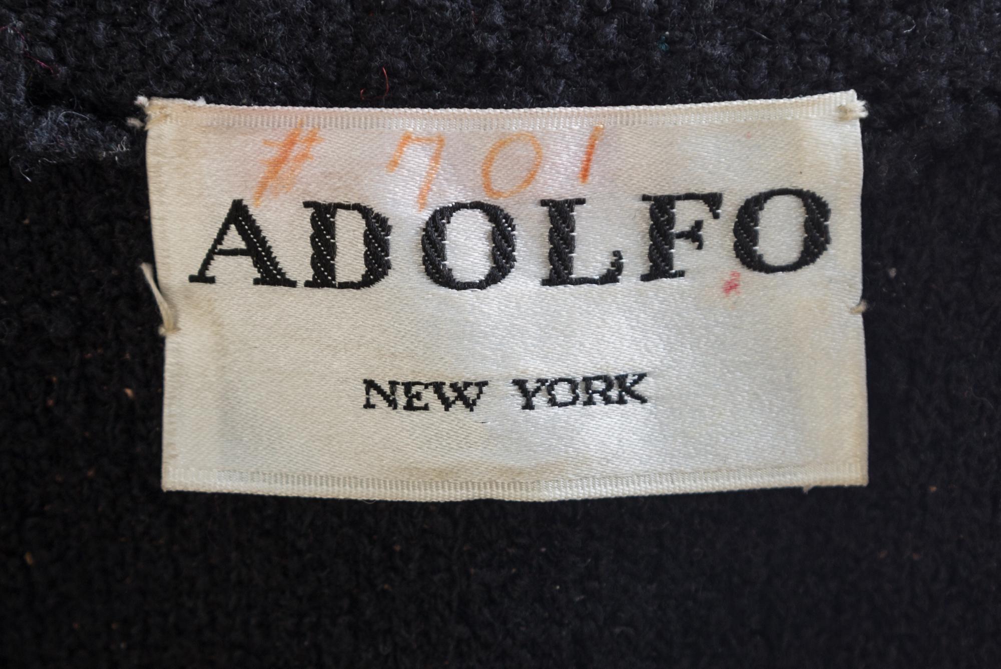 An Adolfo Black Wool Coat, No size.