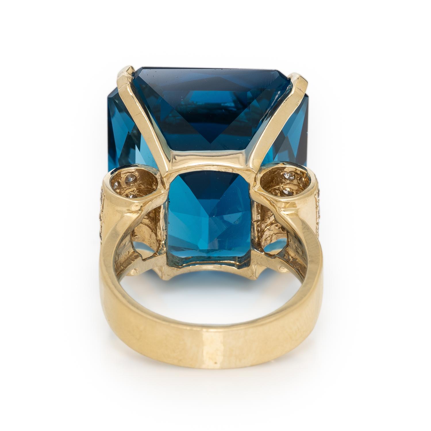 Blue Topaz and Diamond Ring