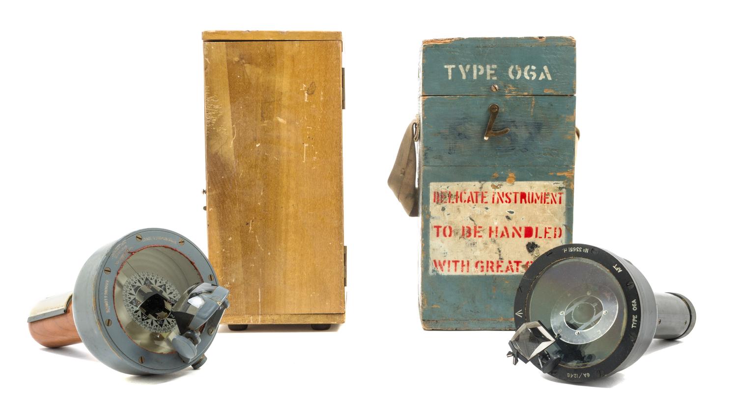 Two English Metal Hand-Held Landing Compasses Height of taller 9 inches. — 20TH CENTURY