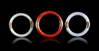 Three Jadeite and Hardstone Circular Bangles