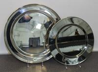 A Reed & Barton Silver-Plate Round Platter, , together with a set of 4 unmarked stainless steel chargers.