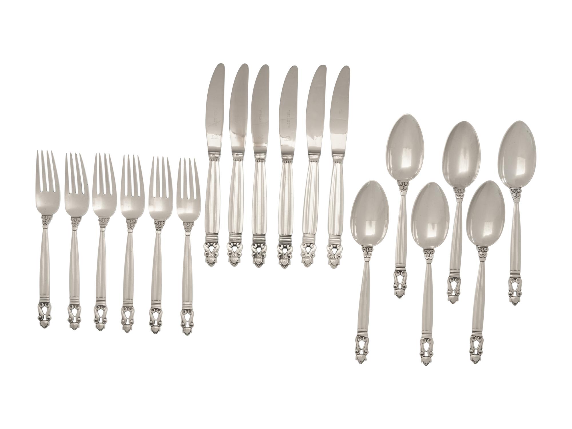 A Set of Eighteen Georg Jensen Acorn Silver Flatware Articles