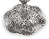 A Set of Four Rococo Revival Silver Candlesticks