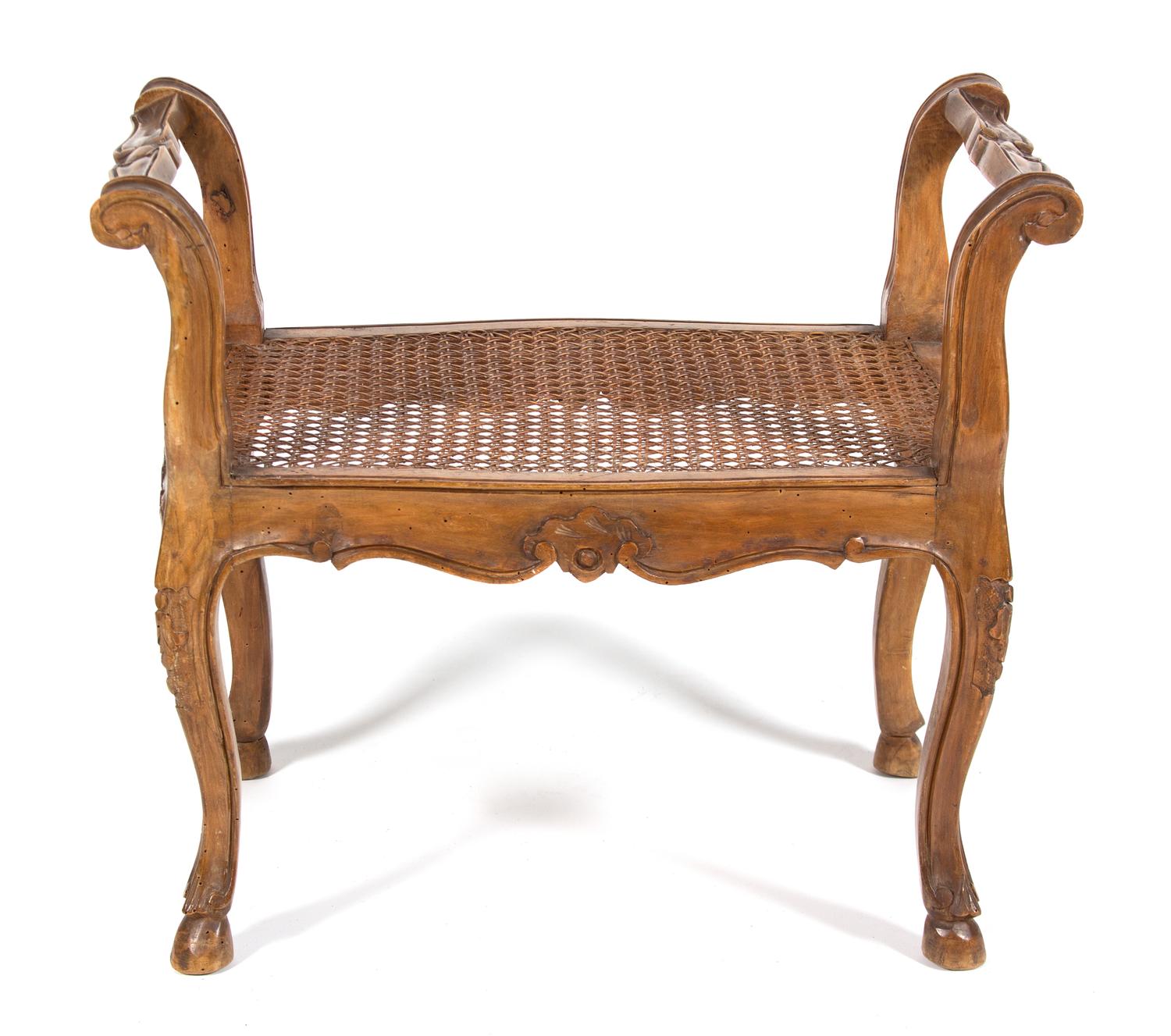 A Louis XV Provincial Style Caned Window Seat Height 21 x width 25 inches. — 20TH CENTURY