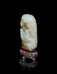 A Chinese White Jade 'Scholars Playing Go' Carving