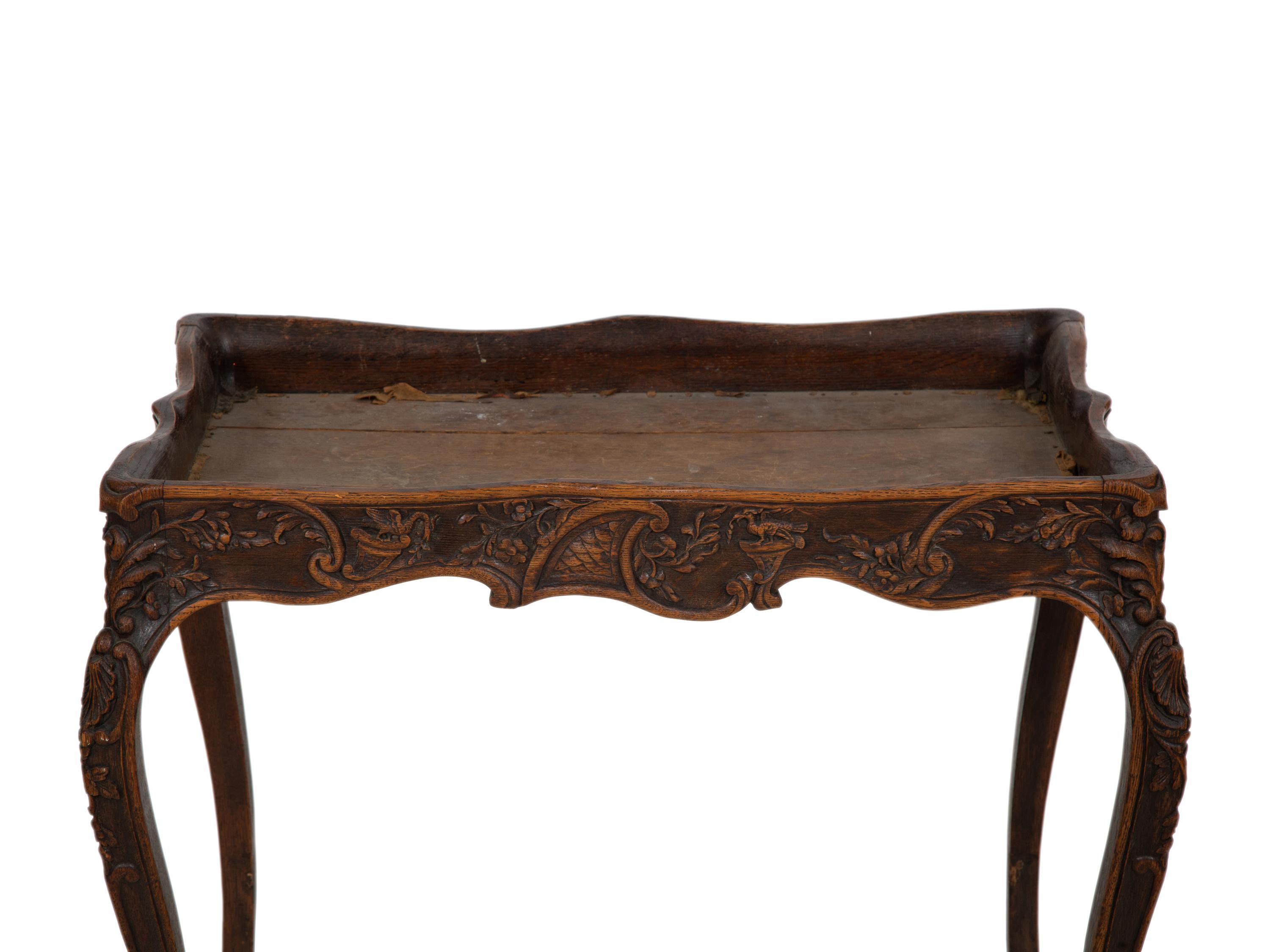 An English Carved Oak Tray-Top Table