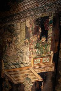 A Coromandel Lacquer Eight-Panel Floor Screen