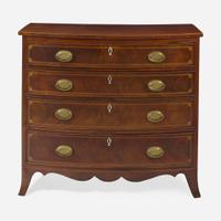 A Federal bowfront inlaid mahogany chest of drawers circa 1800