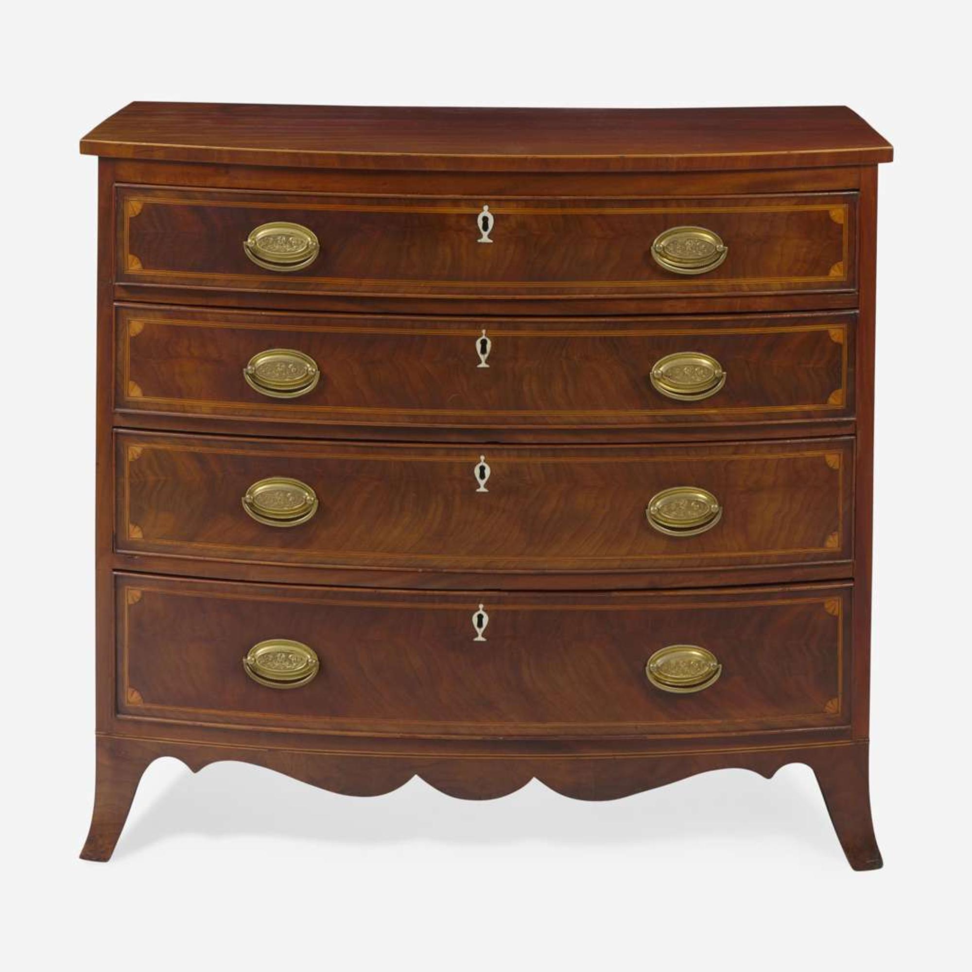 A Federal bowfront inlaid mahogany chest of drawers circa 1800