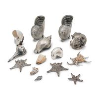 A Collection of Silvered Shells and Shell-Form Table Ornaments