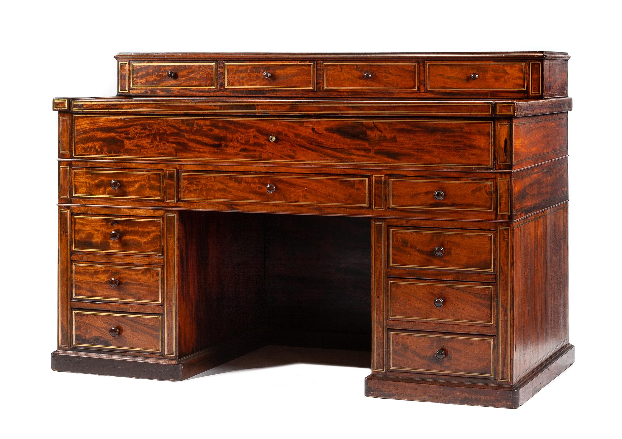 An English Brass Banded Mechanical Desk Height 42 1/2 x width 63 1/2 x depth 30 3/4 inches.