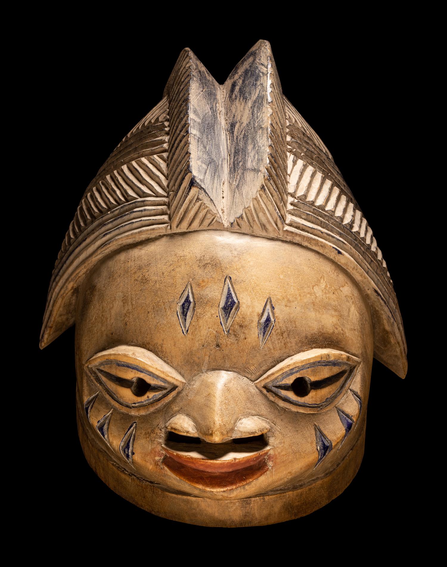 A Yoruba Wood Helmet Mask (Gelede)
