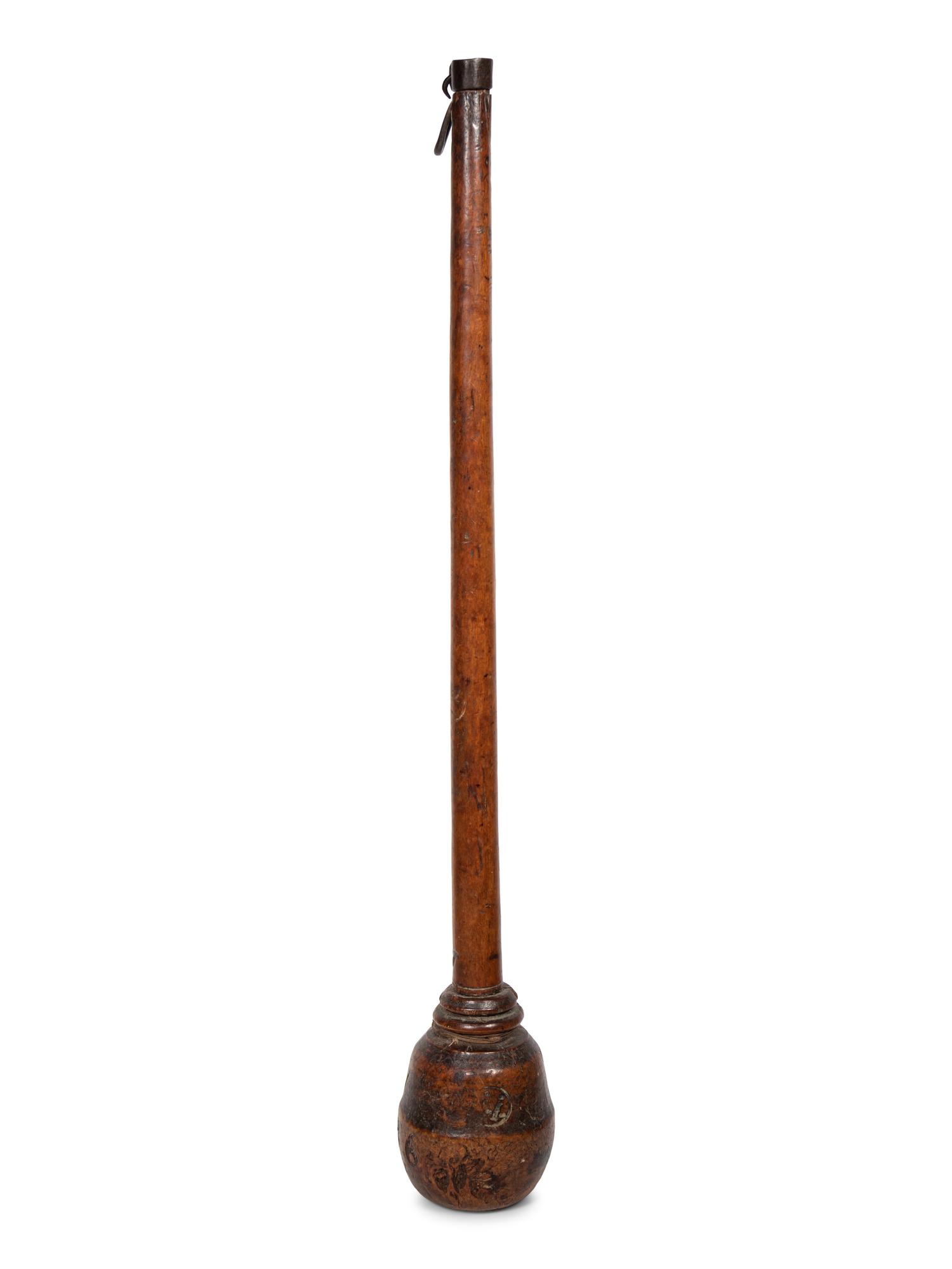 A Continental Carved Wood Pestle