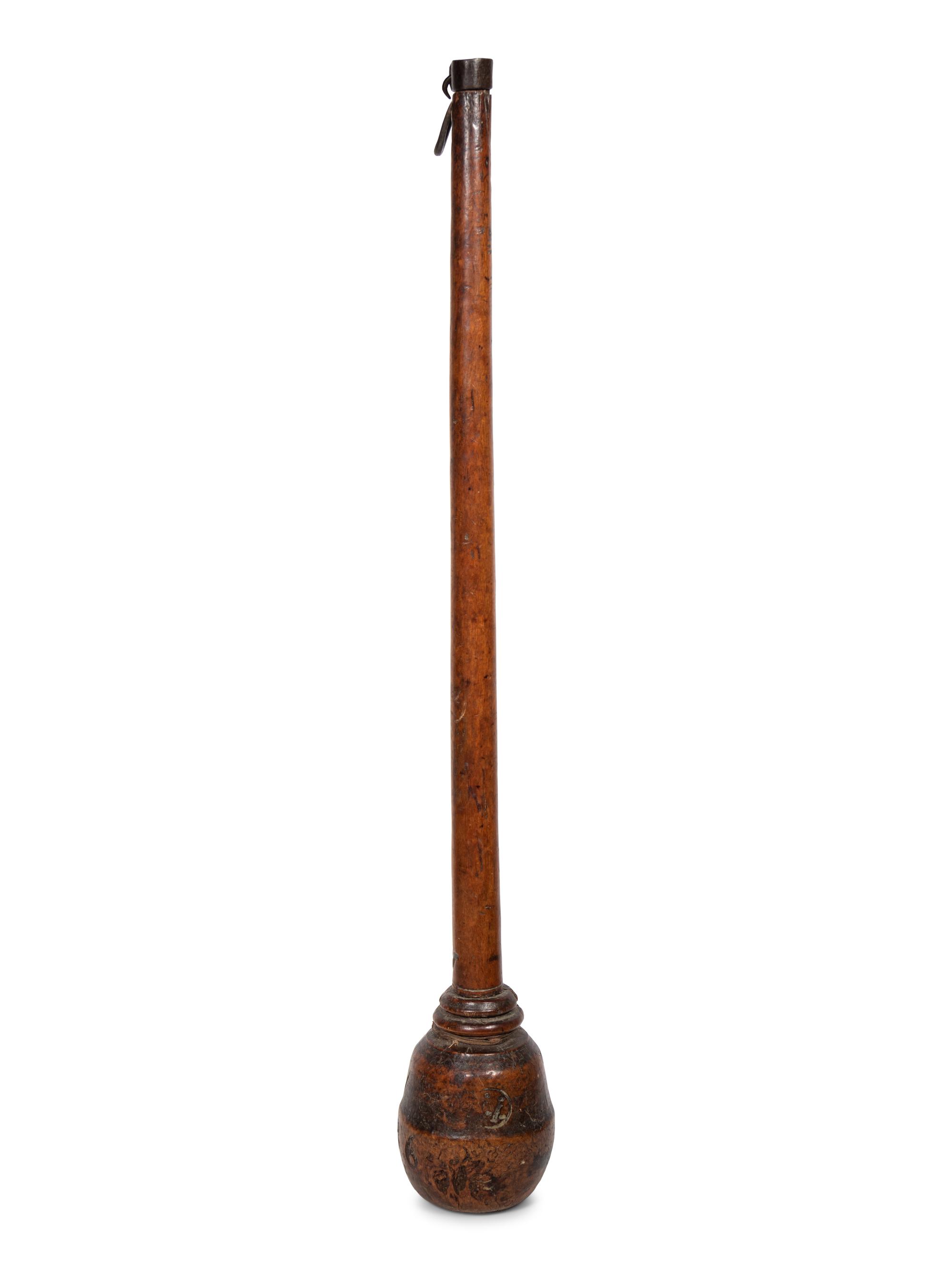 A Continental Carved Wood Pestle