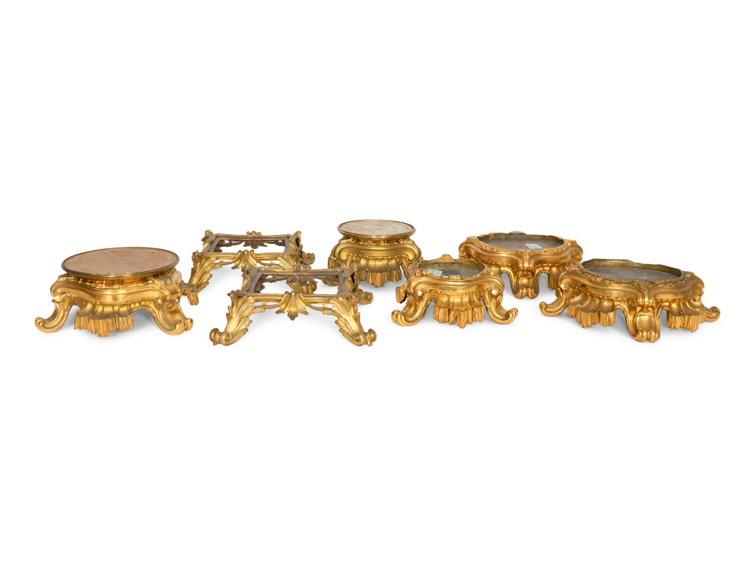 Seven Continental Gilt Bronze Stands