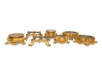 Seven Continental Gilt Bronze Stands