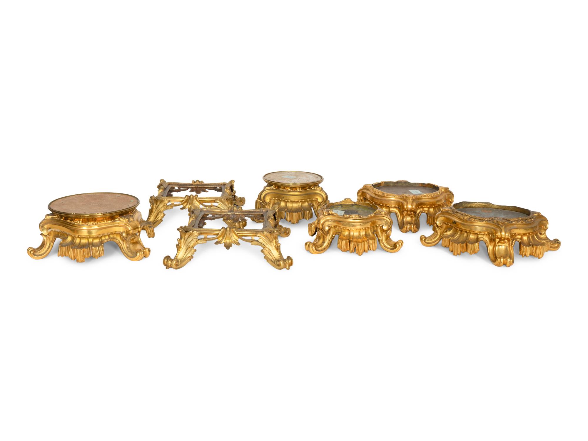 Seven Continental Gilt Bronze Stands