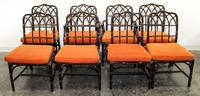 A Set of Eight Rattan Dining Chairs Height 36 1/2 x width 18 x depth 24 inches. — McGUIRE, SAN FRANCISCO, CA