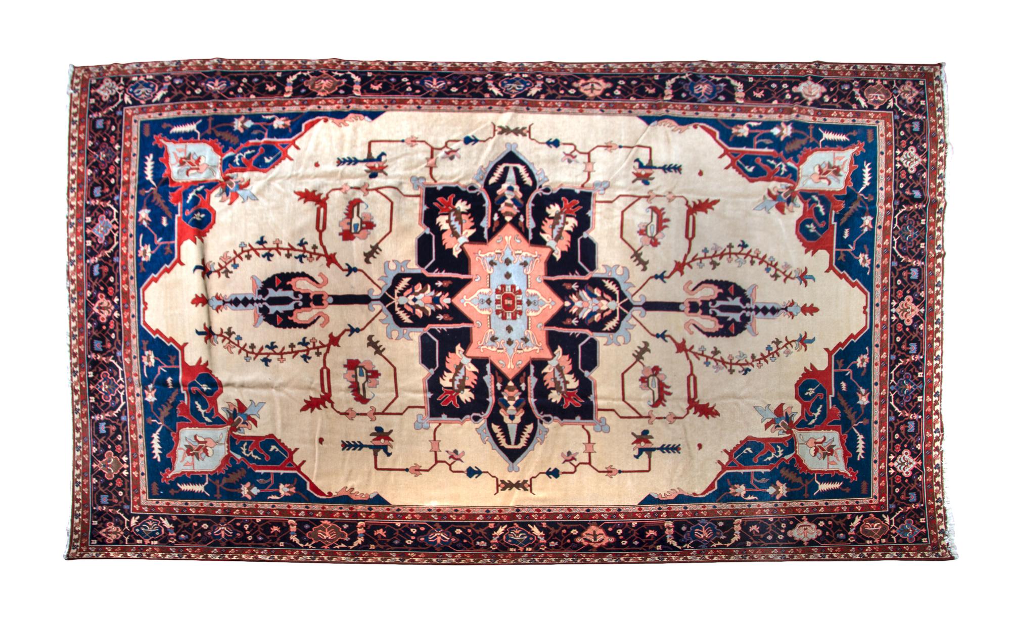 An Oushak or Heriz Wool Rug, MID-20TH CENTURY, 17 feet x 11 feet 8 inches. — MID-20TH CENTURY