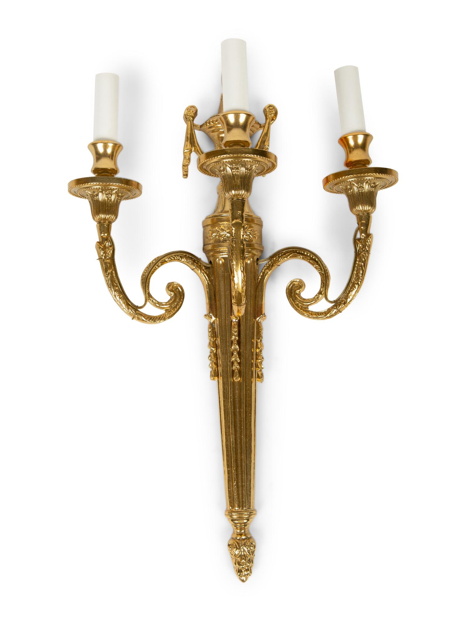 A Set of Four Louis XVI Style Three-Light Brass Sconces — 20TH CENTURY