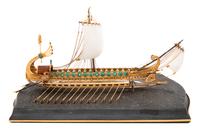 A German 18-Karat Yellow Gold, Rock Crystal, Enameled, Diamond, Emerald and Sapphire Inset Model of a Roman Galley