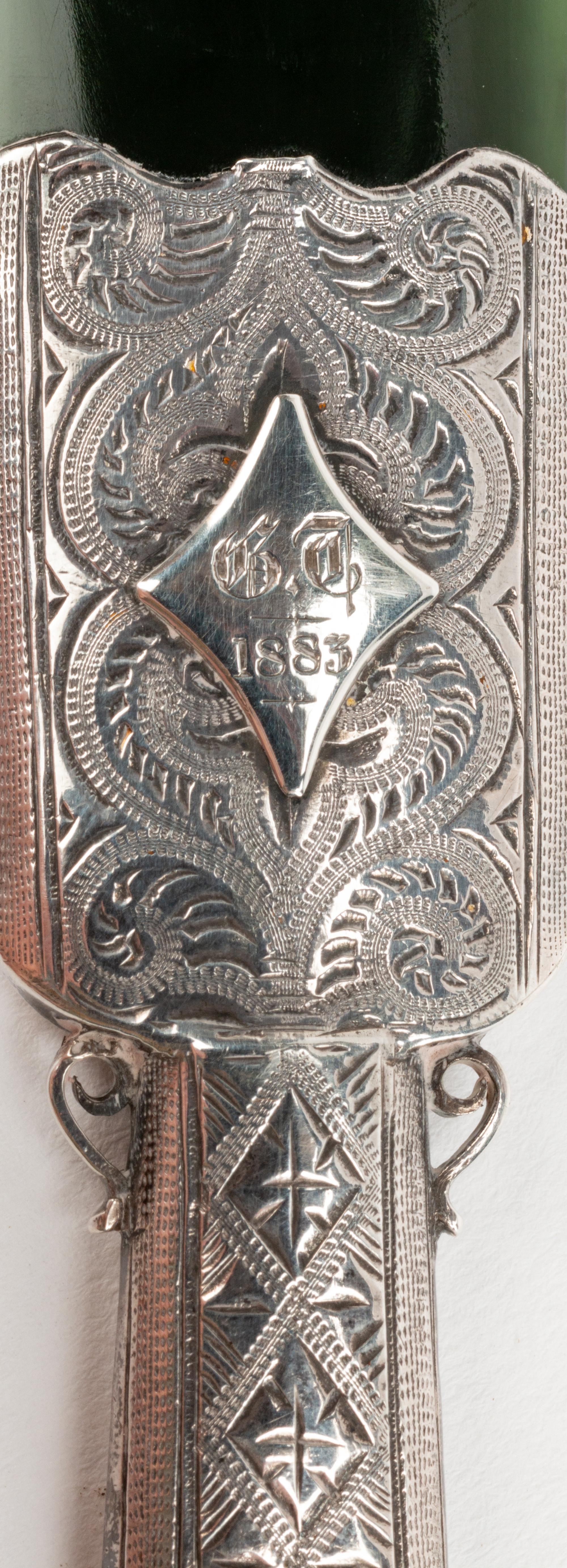 A Silver Mounted Spinach Jade Paper Knife